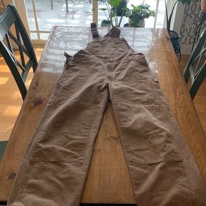 Carhartt uninstalled bibs. Great shape. Some small stains. Double knee.